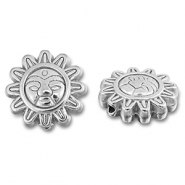 Abalorios Acero Inox flor con rostro Plateado
