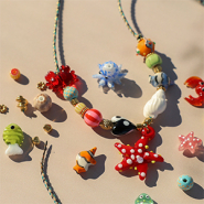 Set de inspiraciones Crea joyas de verano con los colgantes de vidrio