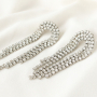 Pulseras y pendientes brillantes con cadena strass
