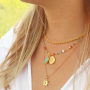 Crea elegantes collares con abalorios y colgantes faceteados de Ojo de Gato