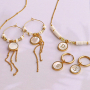 Cree joyer&iacute;a personalizada con colgantes de acero inoxidable y concha
