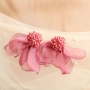 Crea un look &uacute;nico con pendientes de flores