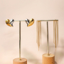 Inspiraci&oacute;n con pendientes de acero inoxidable